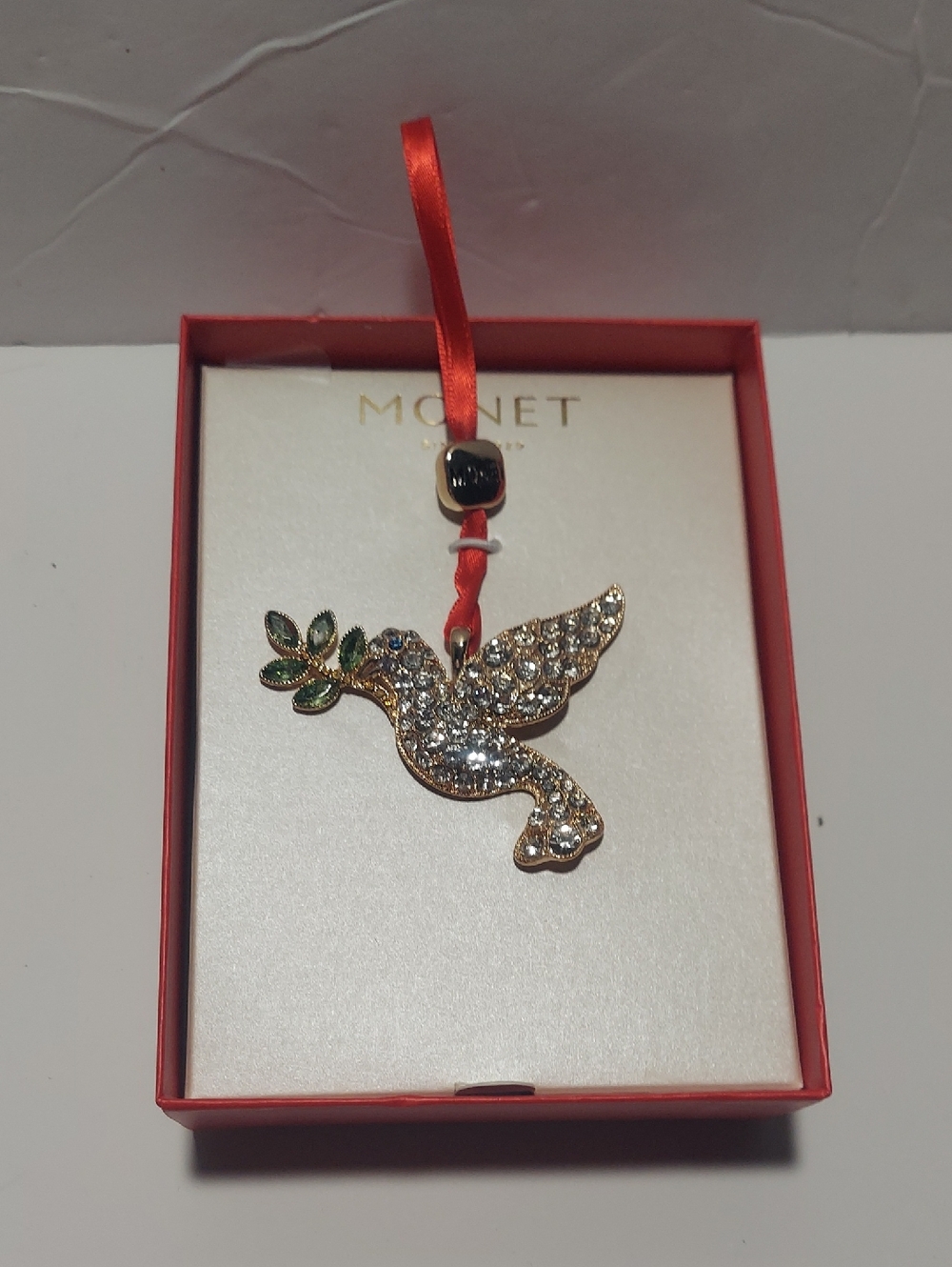 Monet Gold-Tone Dove Ornament with Green Leaf and Red Ribbon